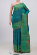 Blue Kanchipuram Saree with Checked design on the body and Thread Border.  displayed on a mannequin
