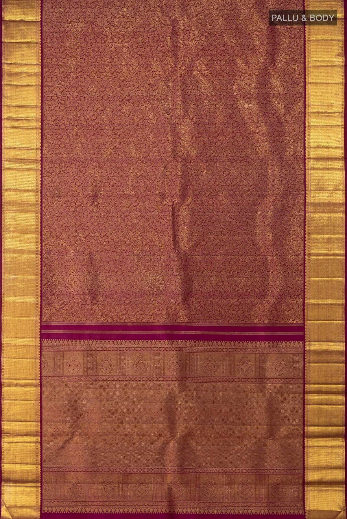 Flat view of Purple Kanchipuram Saree with Zari Brocade on the body and Zari Border. 