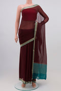 Brown Chiffon Saree with Plain Body and Zari Border.  displayed on a mannequin