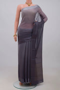 Grey Chiffon Saree with Plain Body and Plain Border.  displayed on a mannequin