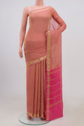Pink Chiffon Saree with Fancy on the body and Zari Border.  displayed on a mannequin