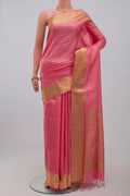 Pink Soft Silk Saree with Jacquard With Zari Butta on the body and Zari Border.  displayed on a mannequin
