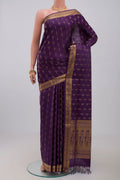 Purple Soft Silk Saree with Jacquard design on the body and Zari Border.  displayed on a mannequin