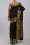 Black Soft Silk Saree with Checked design on the body and Zari Border.  displayed on a mannequin