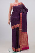 Purple Mysore Crepe Saree with Zari Brocade on the body and Zari Border.  displayed on a mannequin