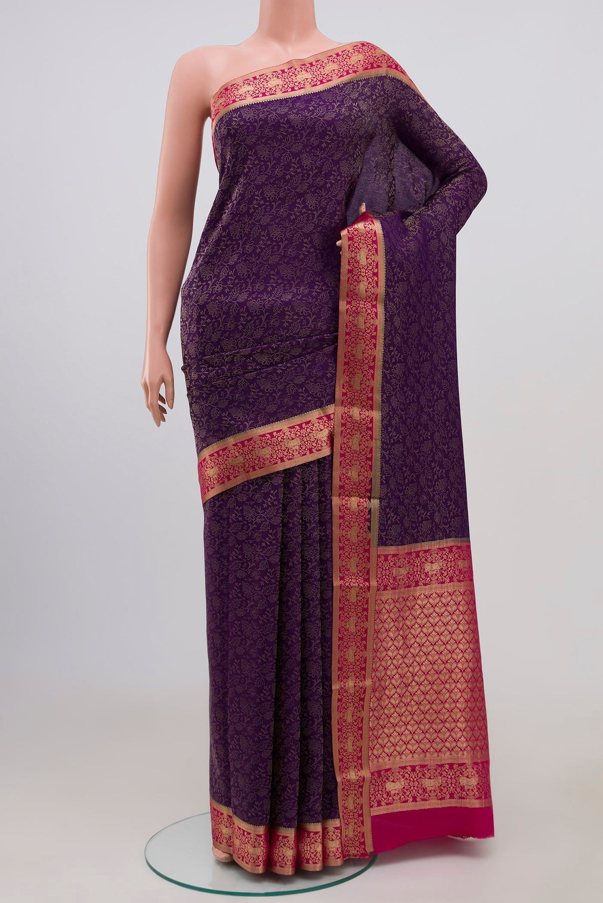 Purple Mysore Crepe Saree with Zari Brocade on the body and Zari Border.  displayed on a mannequin