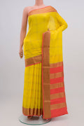 Yellow Crepe Saree with Checked design on the body and Zari Border.  displayed on a mannequin