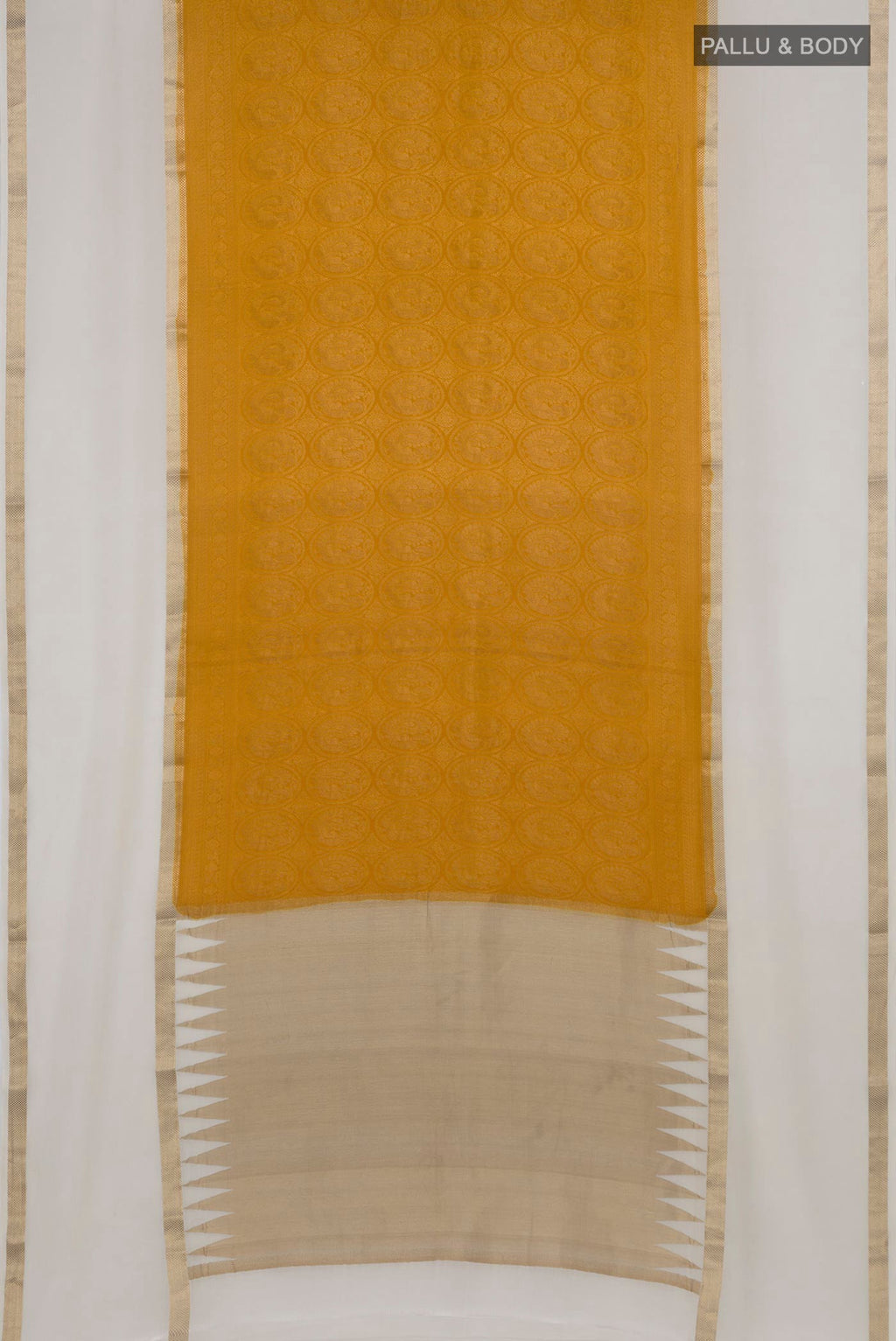 Flat view of Mustard Mysore Crepe Saree with Zari Brocade on the body and Zari Border. 