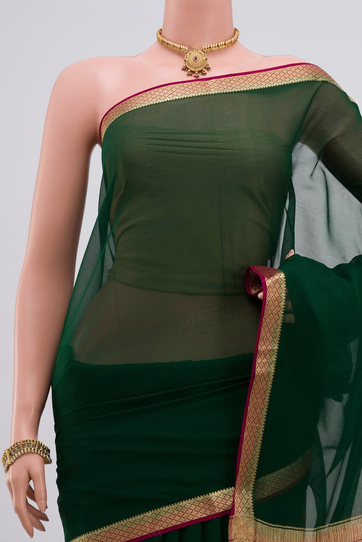 Border image of Green Chiffon Saree with Plain Body and Zari Border. 