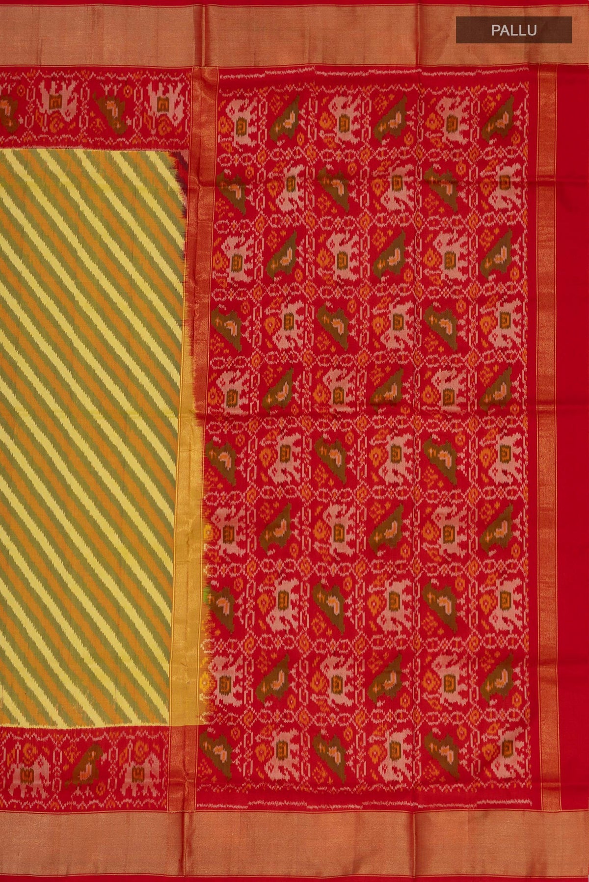 Close up image of the pallu of Green Pochampally Silk Saree with Ikat Print on the body and Zari Border. 