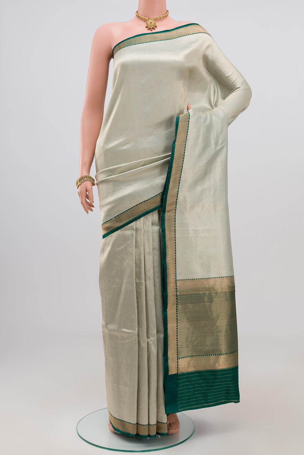 Blue Banarasi Katan Silk Saree with Zari Brocade on the body and Zari Border.  displayed on a mannequin