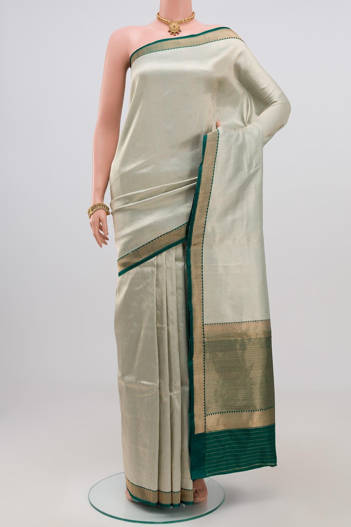 Blue Banarasi Katan Silk Saree with Zari Brocade on the body and Zari Border.  displayed on a mannequin