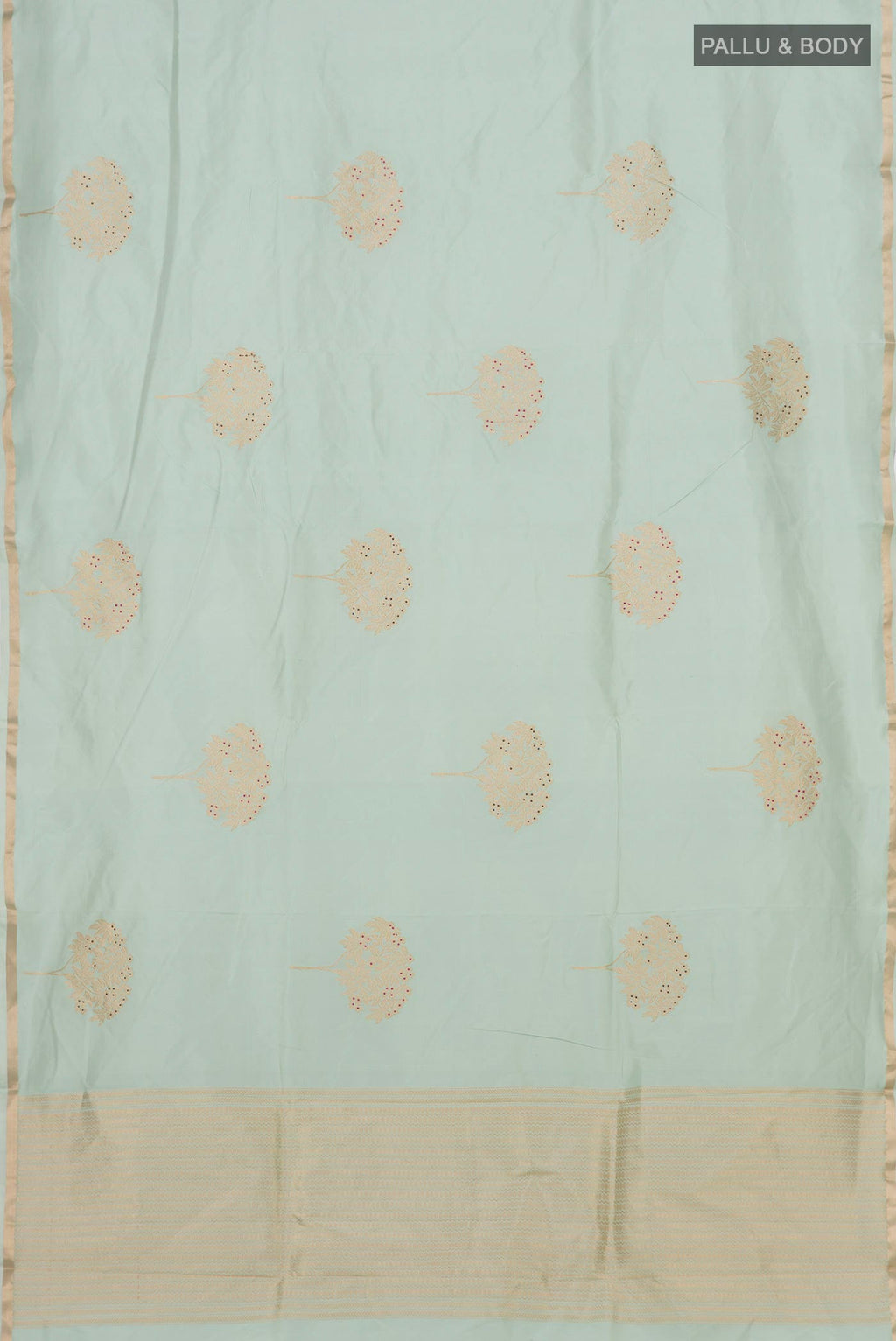 Flat view of Light Green Banarasi Katan Silk Saree with Zari Butta on the body and Thin Zari Line. 