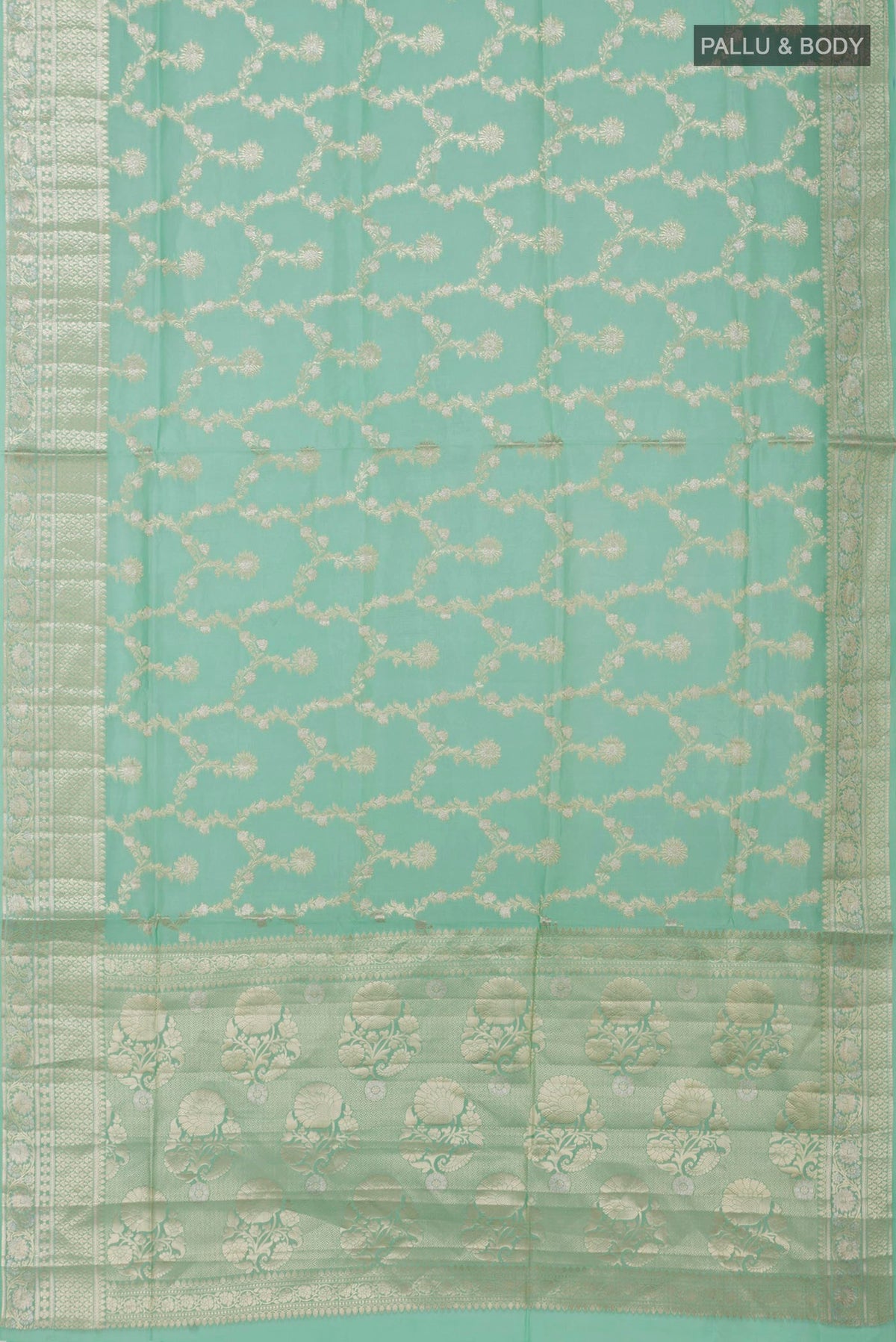 Flat view of Light Green Raw Silk Saree with Zari Butta on the body and Zari Border. 