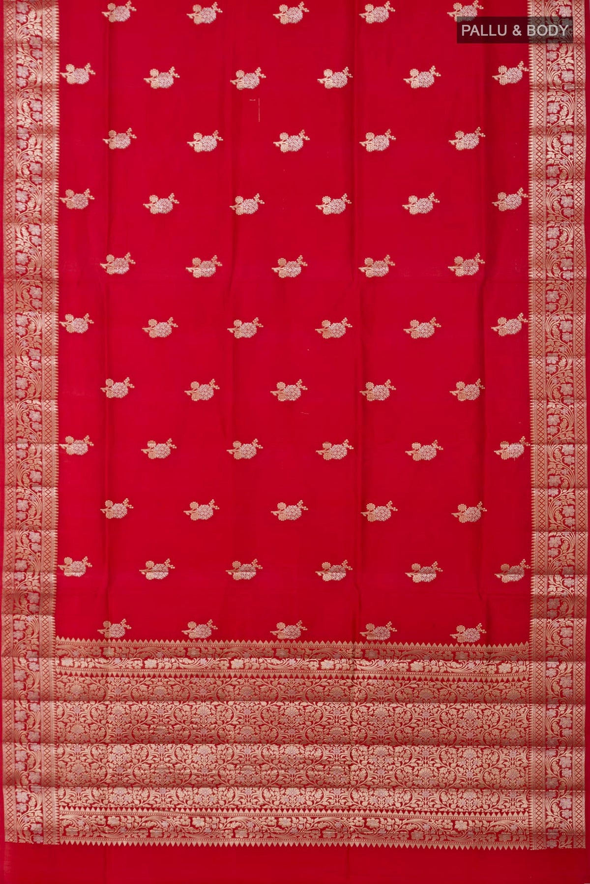 Flat view of Red Raw Silk Saree with Zari Butta on the body and Zari Border. 