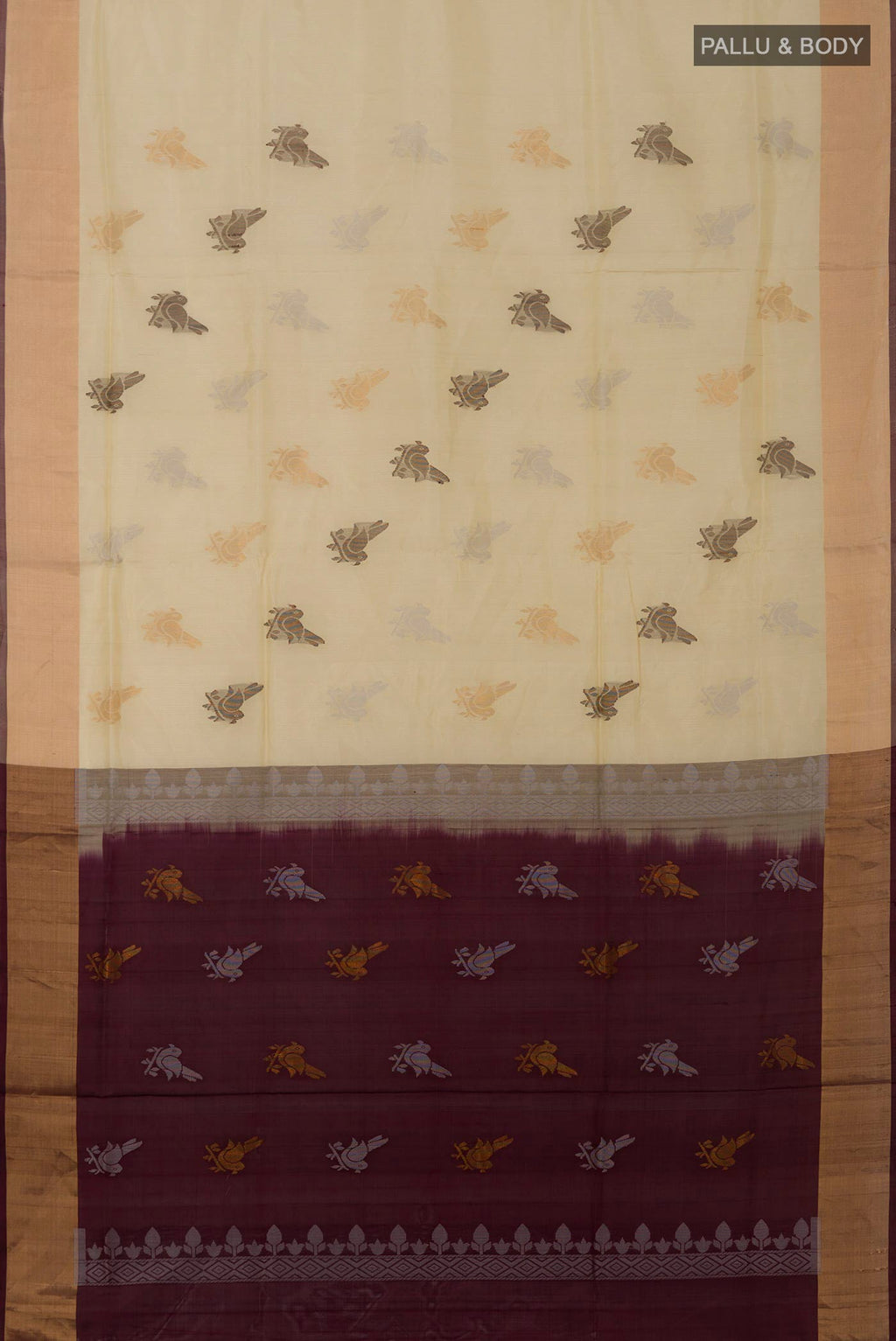 Flat view of Cream Uppada Silk Saree with Zari And Thread Butta on the body and Zari Border. 