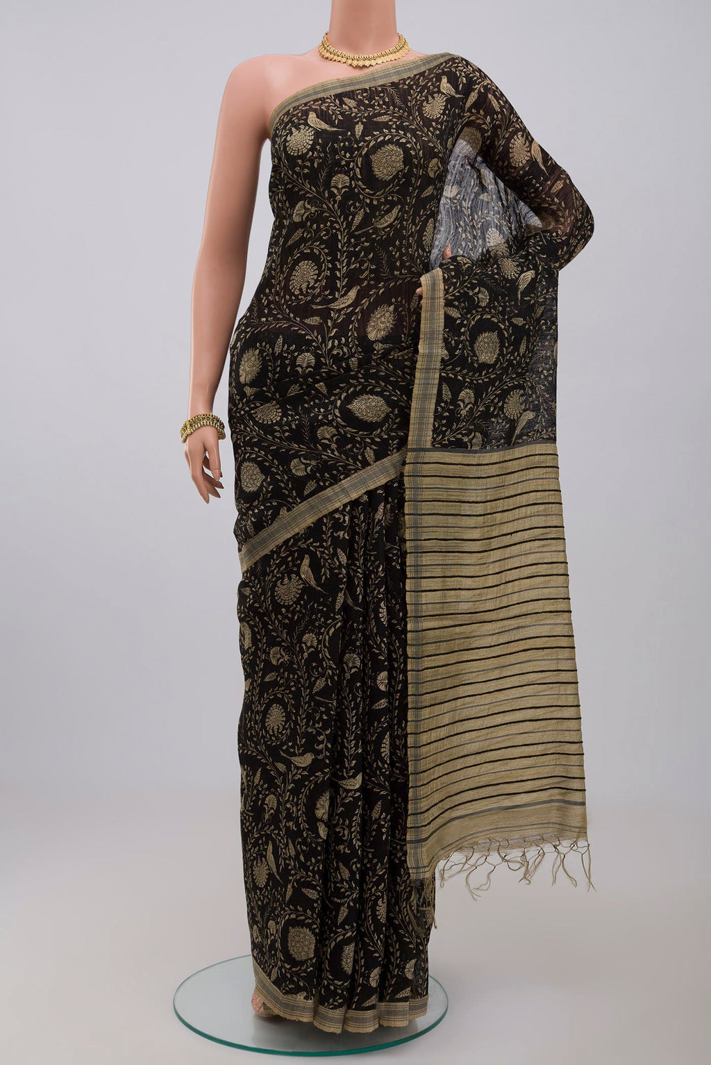Black Jute Silk Saree with Fancy on the body and Without Border.  displayed on a mannequin