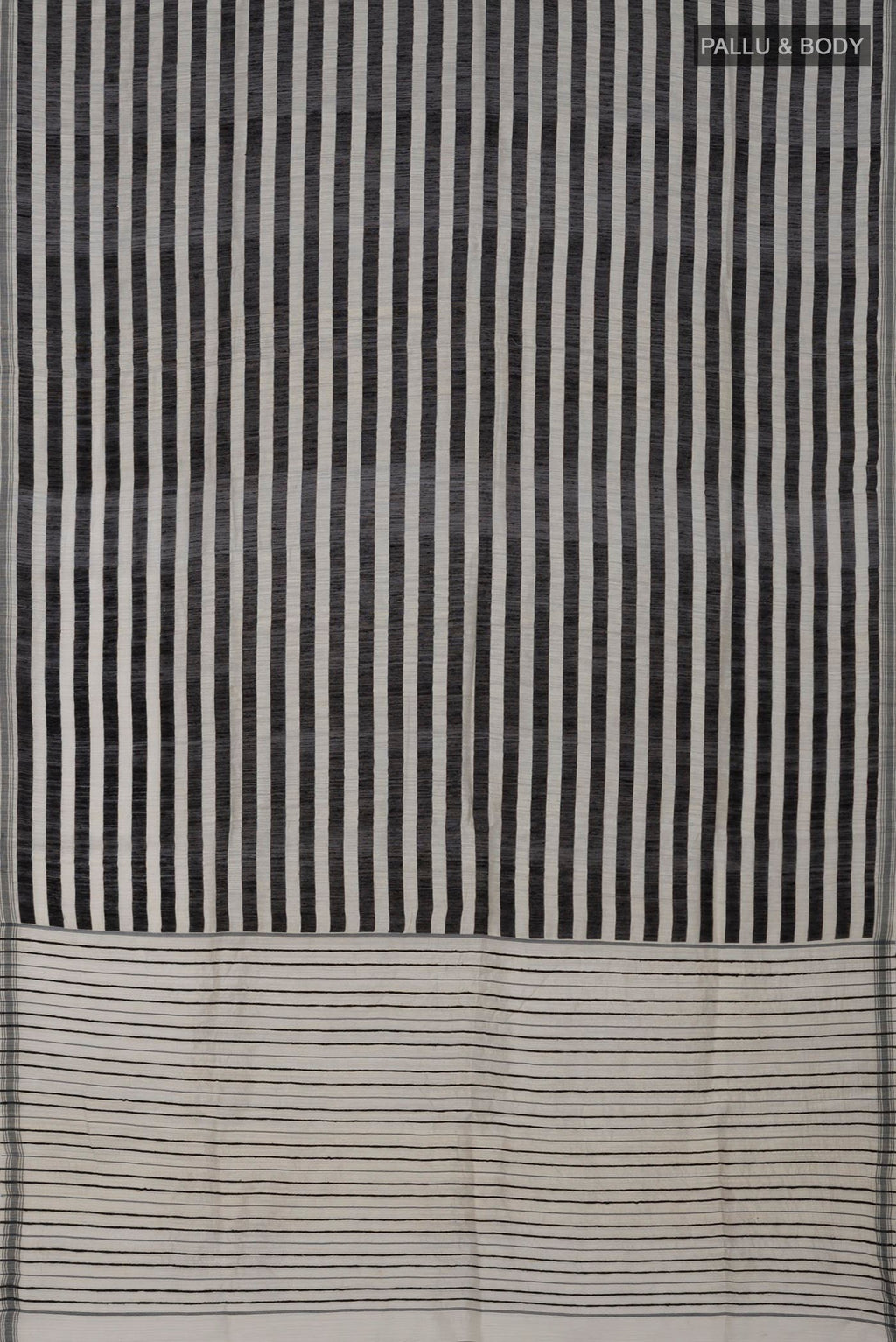 Flat view of Black Jute Silk Saree with Fancy on the body and Without Border. 