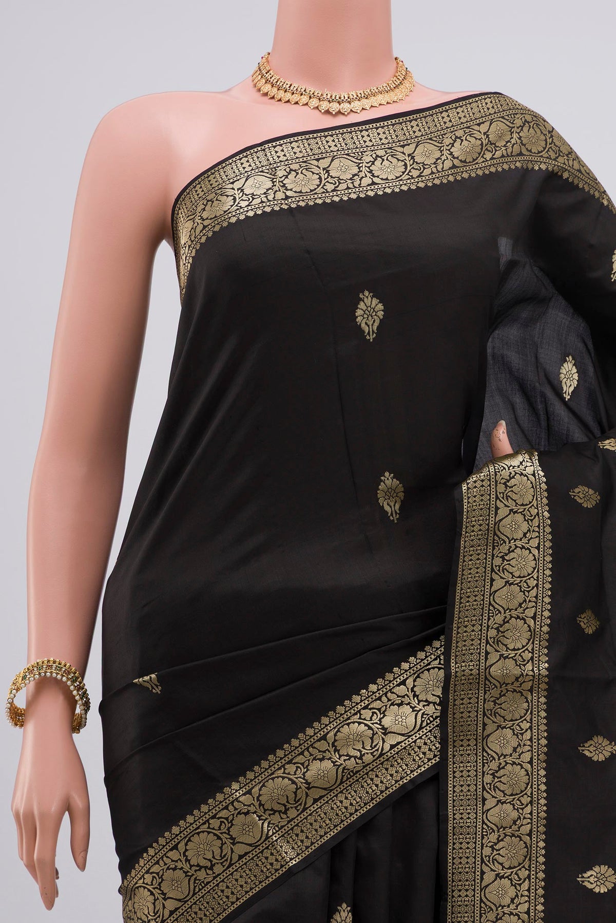 Border image of Black Banarasi Katan Silk Saree with Zari Butta on the body and Zari Border. 