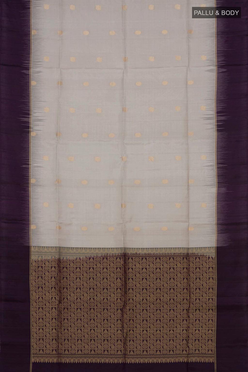 Flat view of Grey Soft Silk Saree with Zari Butta on the body and Plain Border. 