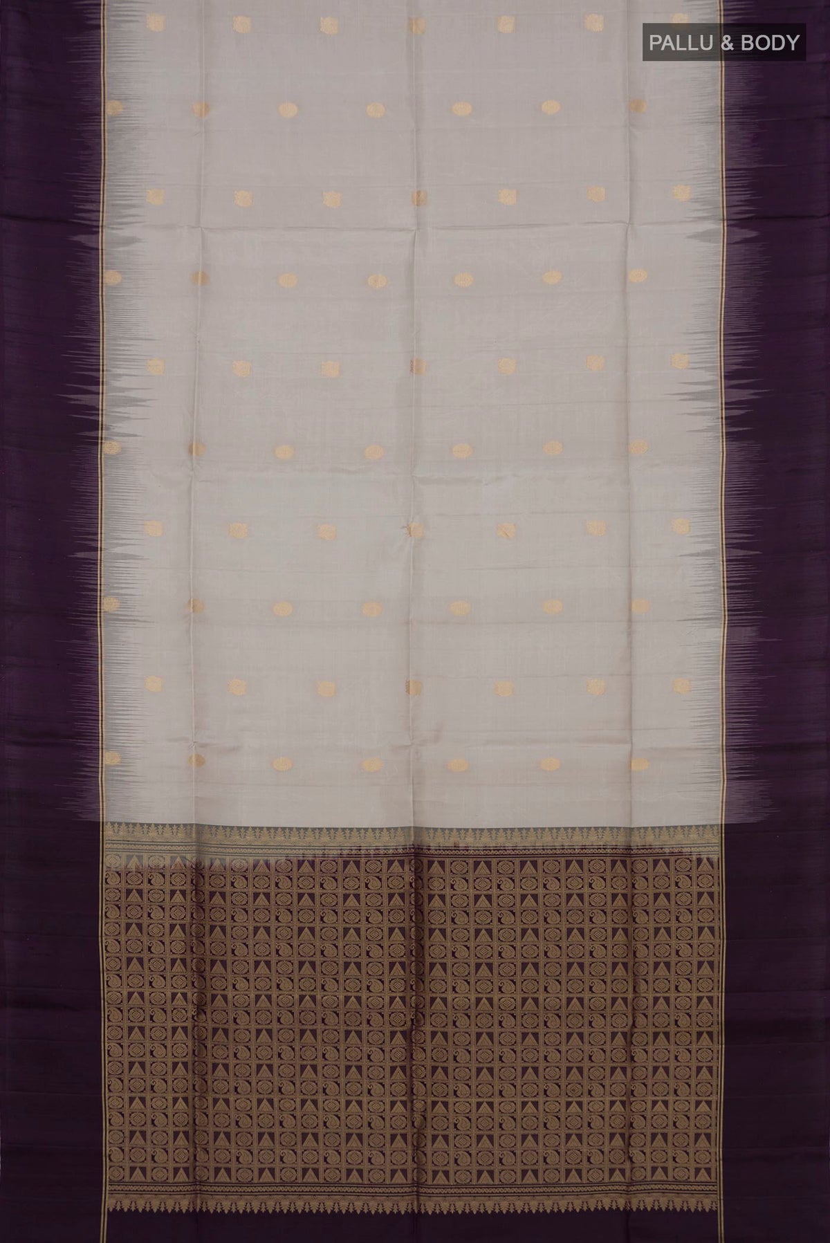 Flat view of Grey Soft Silk Saree with Zari Butta on the body and Plain Border. 