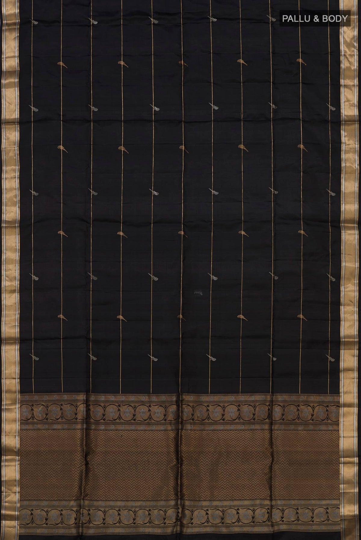 Flat view of Black Soft Silk Saree with Zari Butta on the body and Zari Border. 