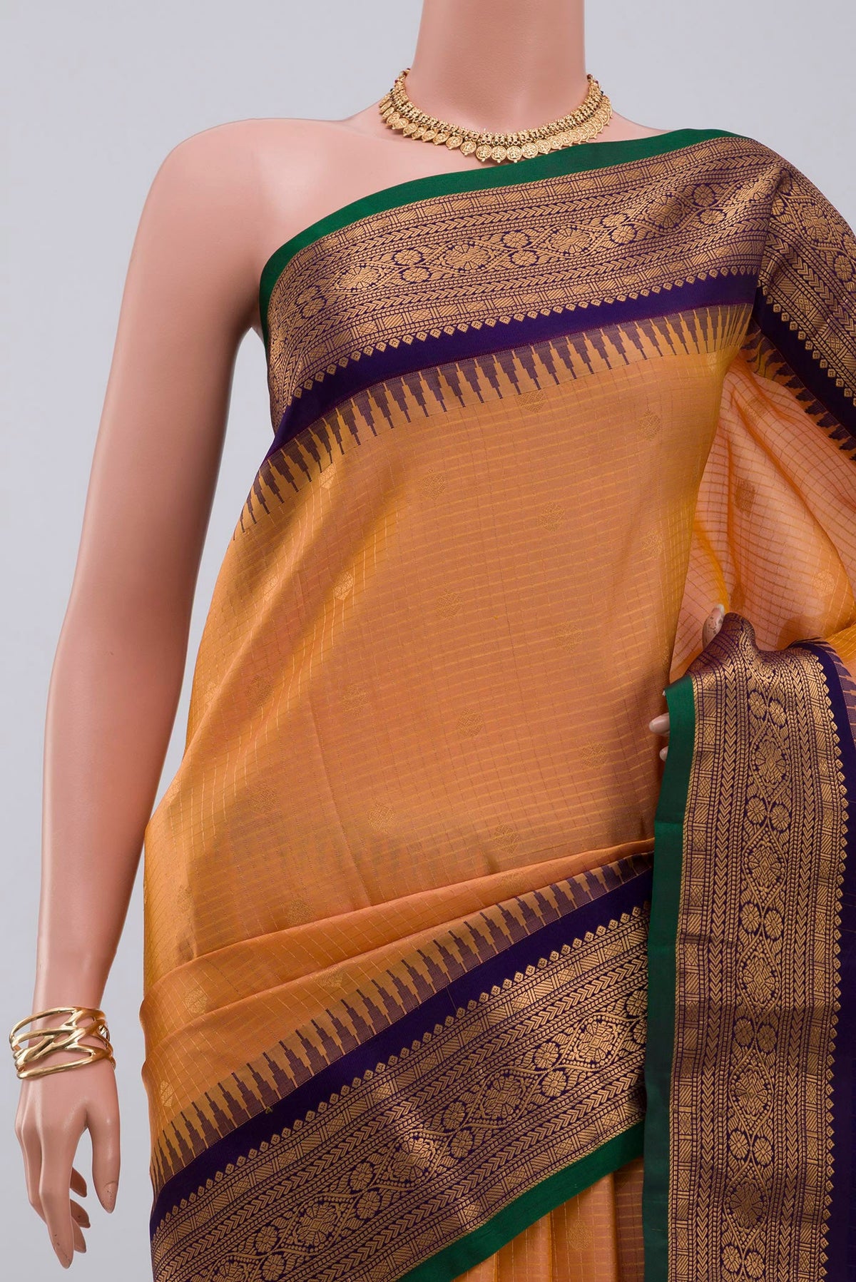 Border image of Peach Gadwal Silk Saree with Checked design on the body and Zari Border. 