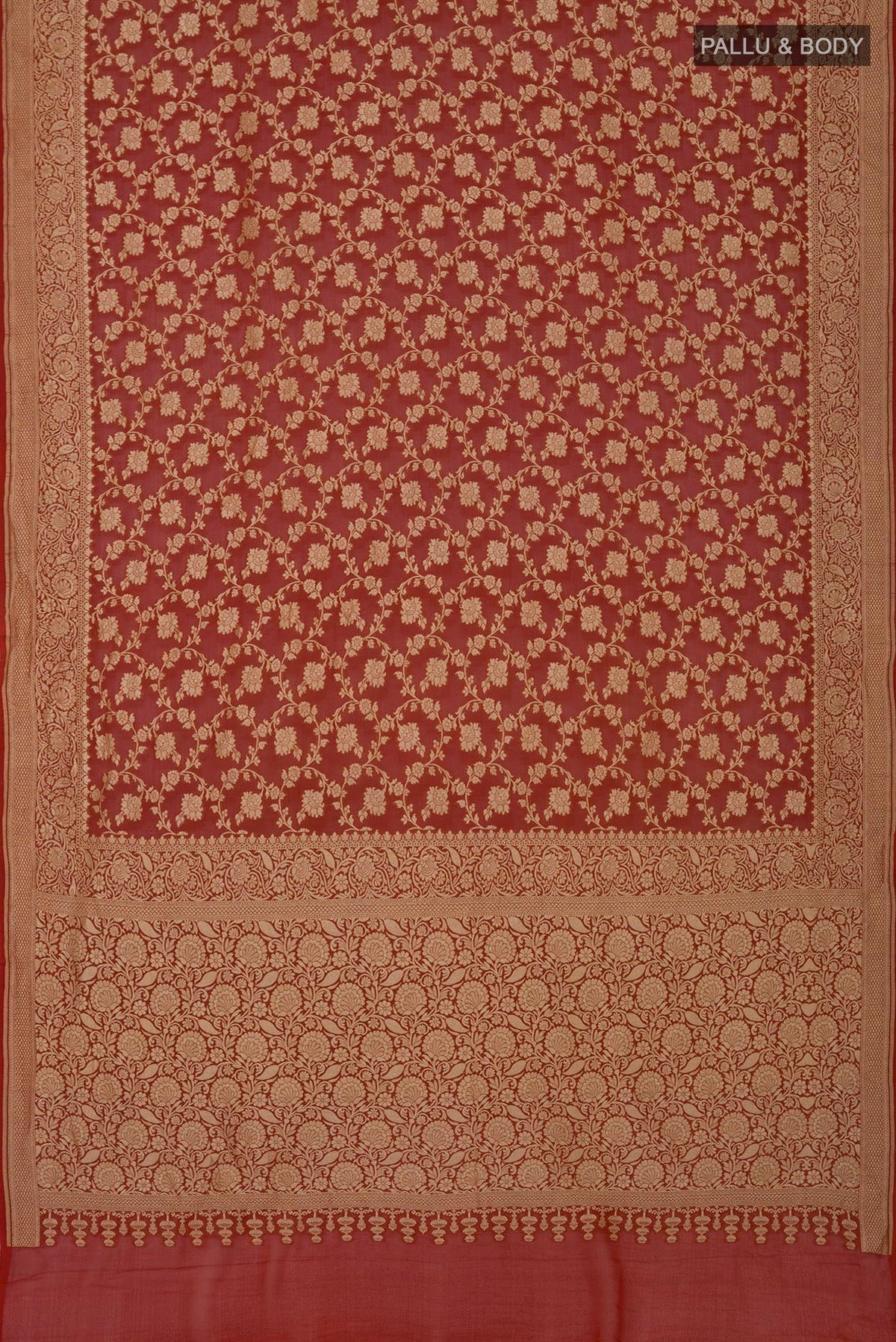 Flat view of Rust Georgette Saree with Fancy on the body and Fancy Border. 