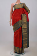 Red Kanjivaram Saree with Zari Brocade on the body and Zari Border.  displayed on a mannequin