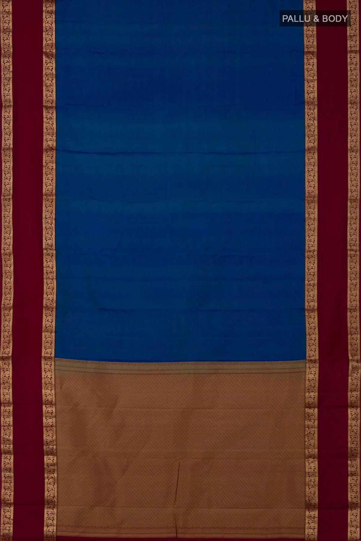 Flat view of Blue Kanchipuram Saree with Plain Body and Zari Border. 