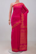 Pink Kanjivaram Silk Saree with Zari Butta on the body and Fancy Border.  displayed on a mannequin
