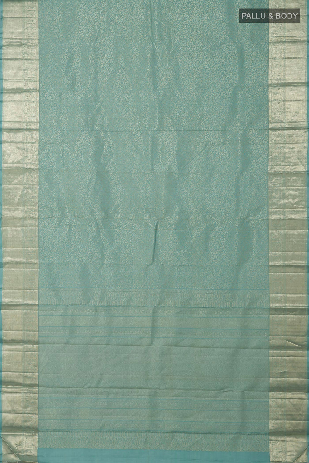 Flat view of Light Blue Kanchipuram Silk Saree with Zari Brocade on the body and Zari Border. 