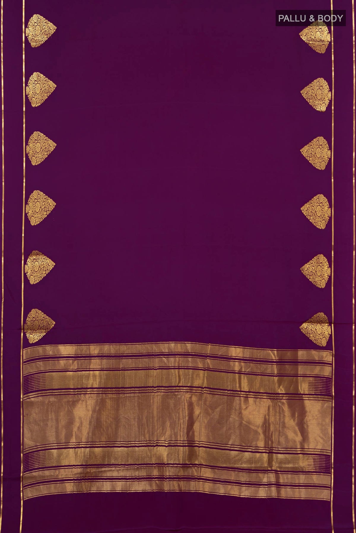 Flat view of Purple Crepe Saree with Plain Body and Thin Zari Line. 