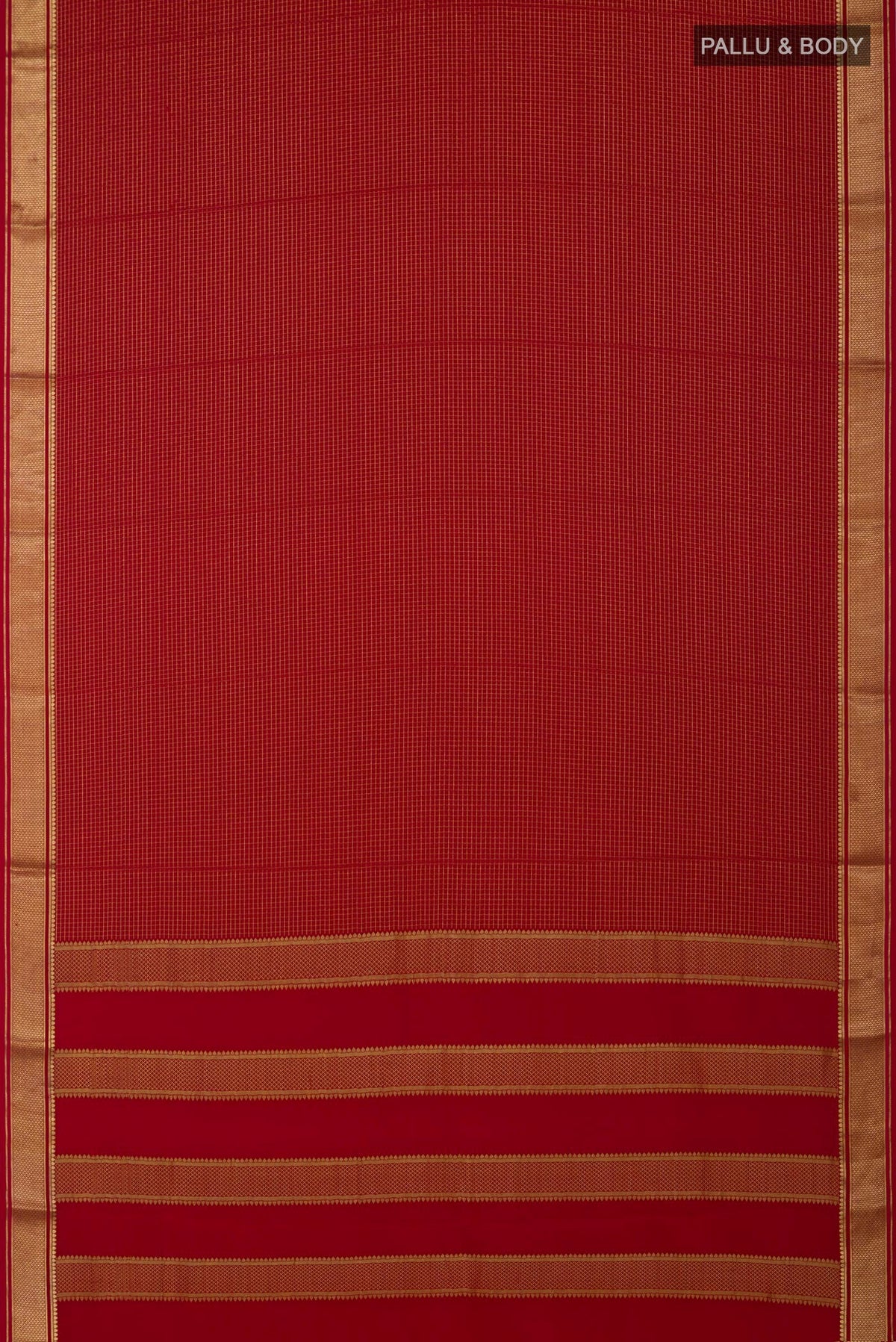 Flat view of Red Crepe Saree with Checked design on the body and Zari Border. 