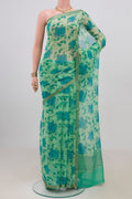 Mint Green Mysore Chiffon Saree with Floral Print on the body and Zari Border.  displayed on a mannequin