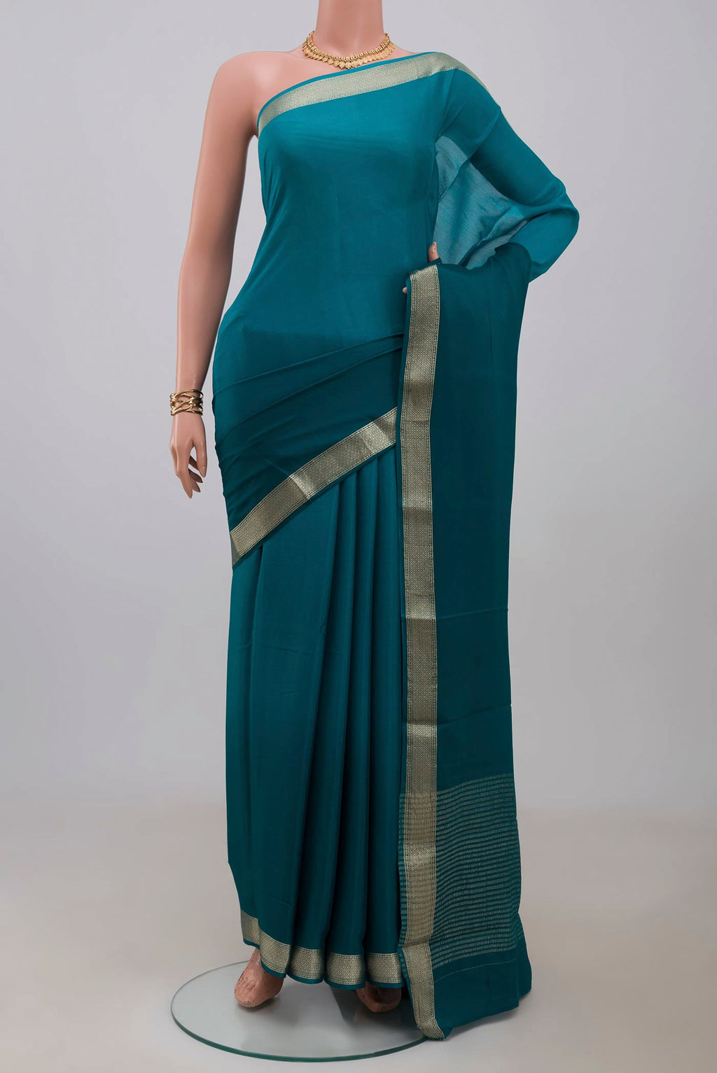 Blue Mysore Chiffon Saree with Ombre design on the body and Zari Border.  displayed on a mannequin