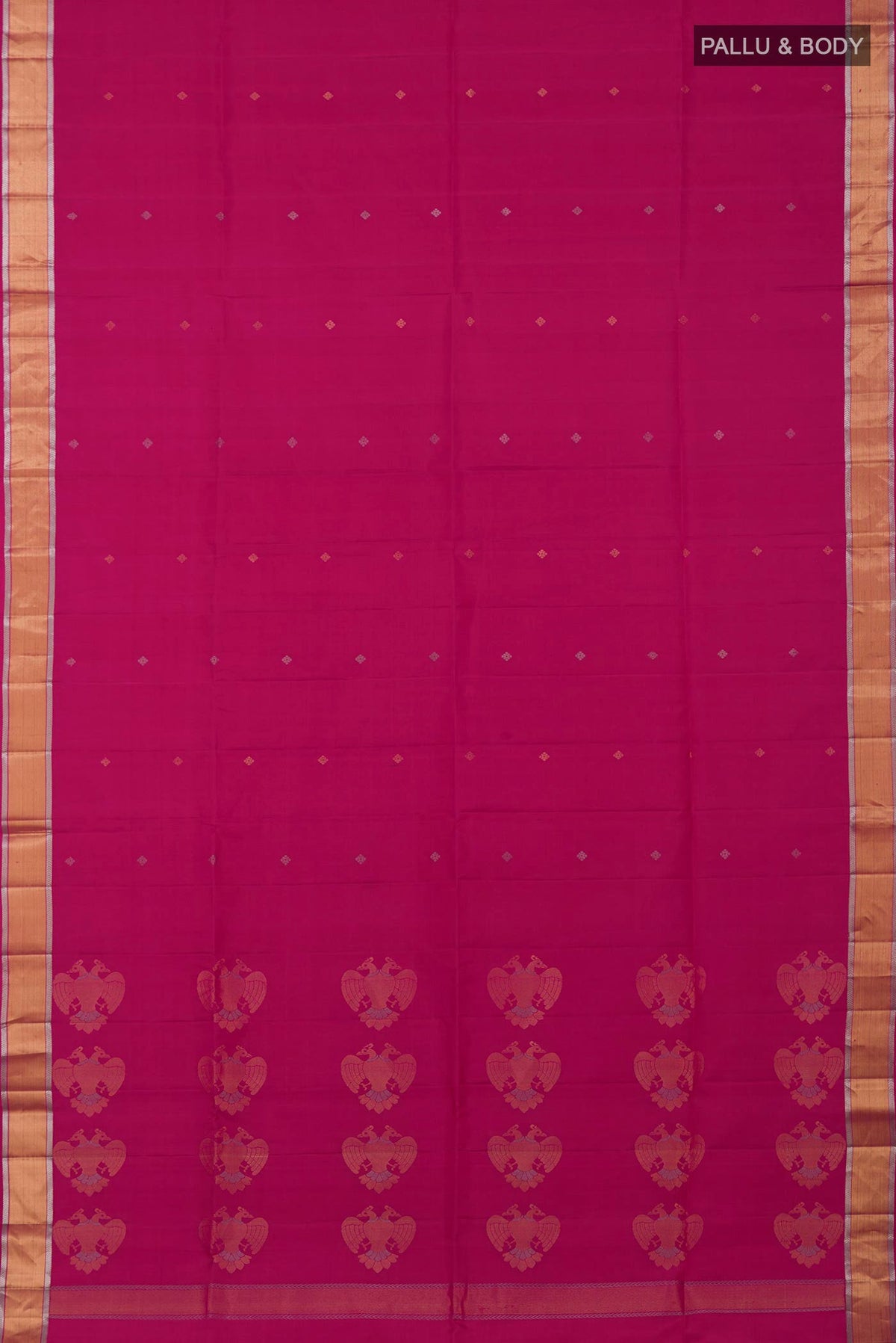 Flat view of Rani Pink Soft Silk Saree with Zari Butta on the body and Zari Border. 