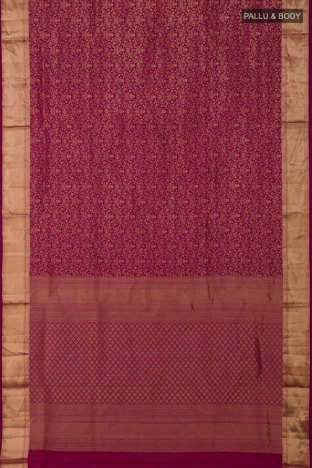 Flat view of Magenta Soft Silk Saree with Zari Brocade on the body and Zari Border. 