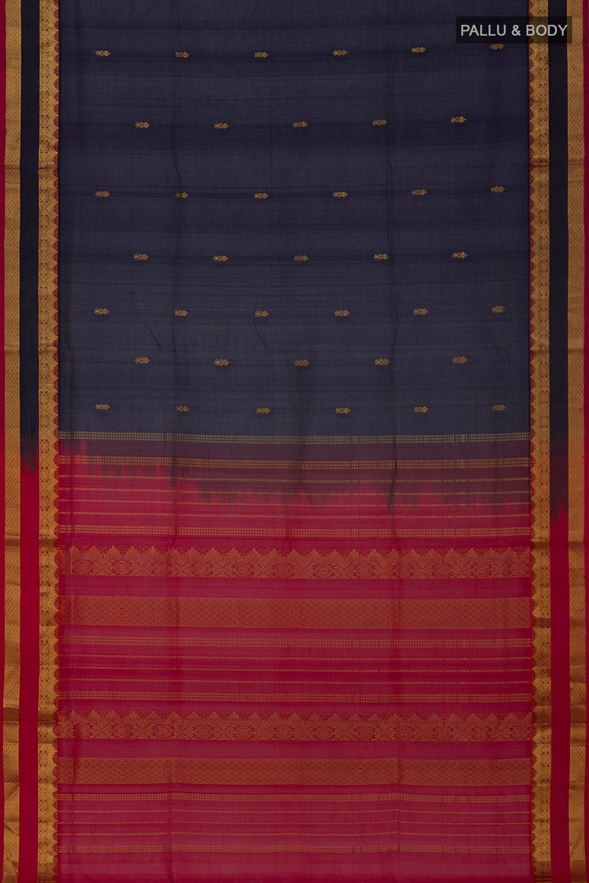 Flat view of Navy Blue Silk Cotton Saree with Zari Butta on the body and Zari Border. 