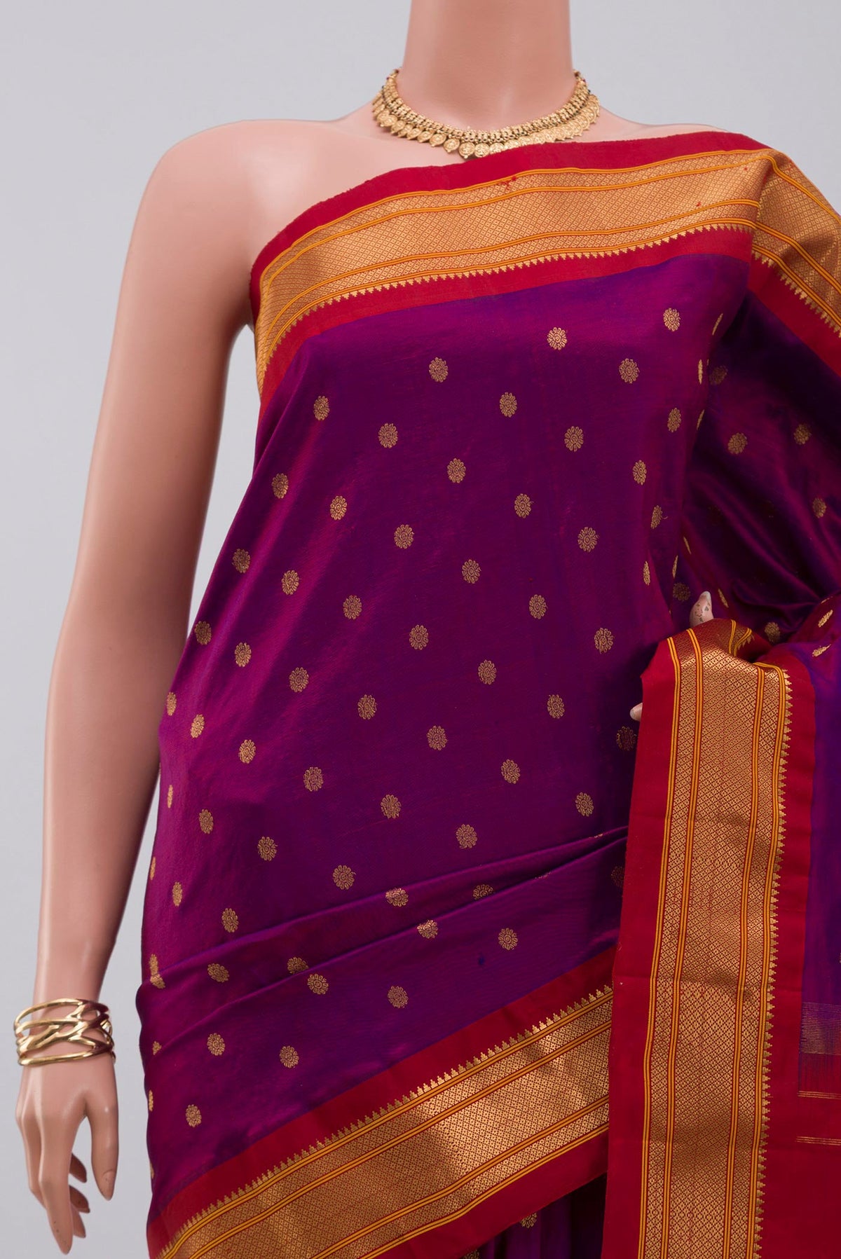 Border image of Purple Gadwal Silk Saree with Zari Butta on the body and Zari Border. 