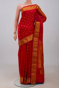 Red Gadwal Silk Saree with Zari Butta on the body and Zari Border.  displayed on a mannequin