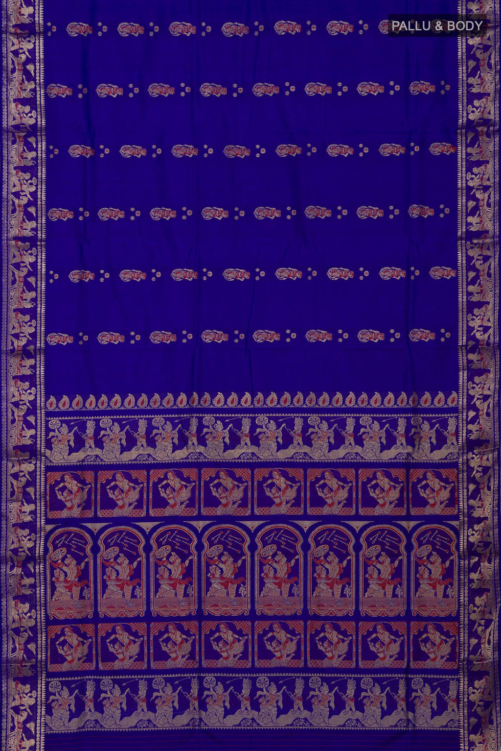 Flat view of Blue Baluchari Silk Saree with Zari And Thread Butta on the body and Zari Border. 