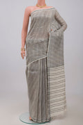 Cream Jute Silk Saree with Fancy on the body and Plain Border.  displayed on a mannequin