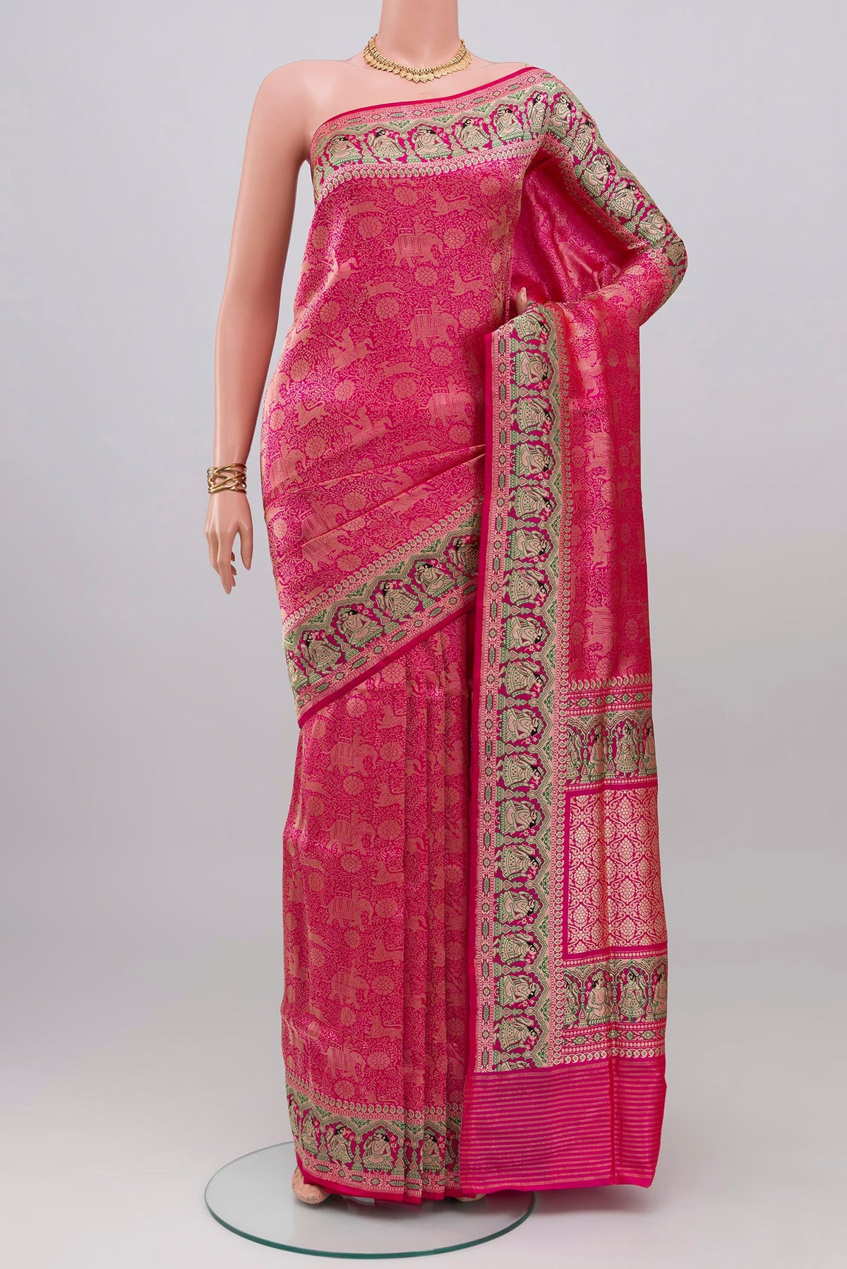 Pink Banarasi Silk Saree with Zari Brocade on the body and Fancy Border.  displayed on a mannequin