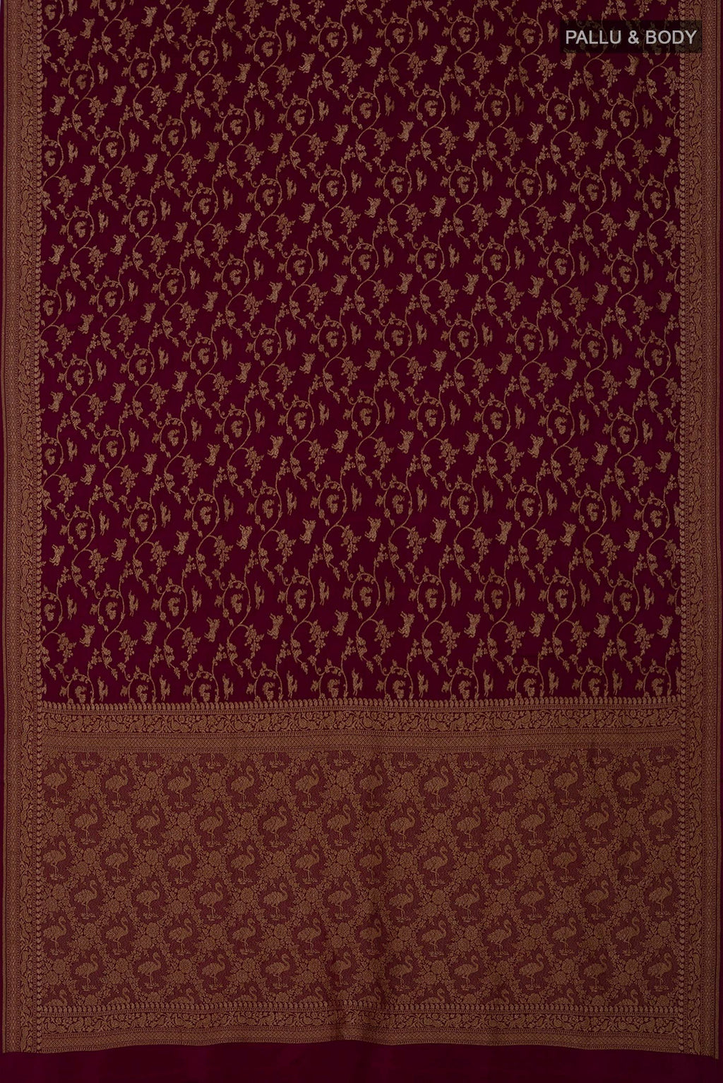Flat view of Brown Georgette Saree with Fancy on the body and Zari Border. 