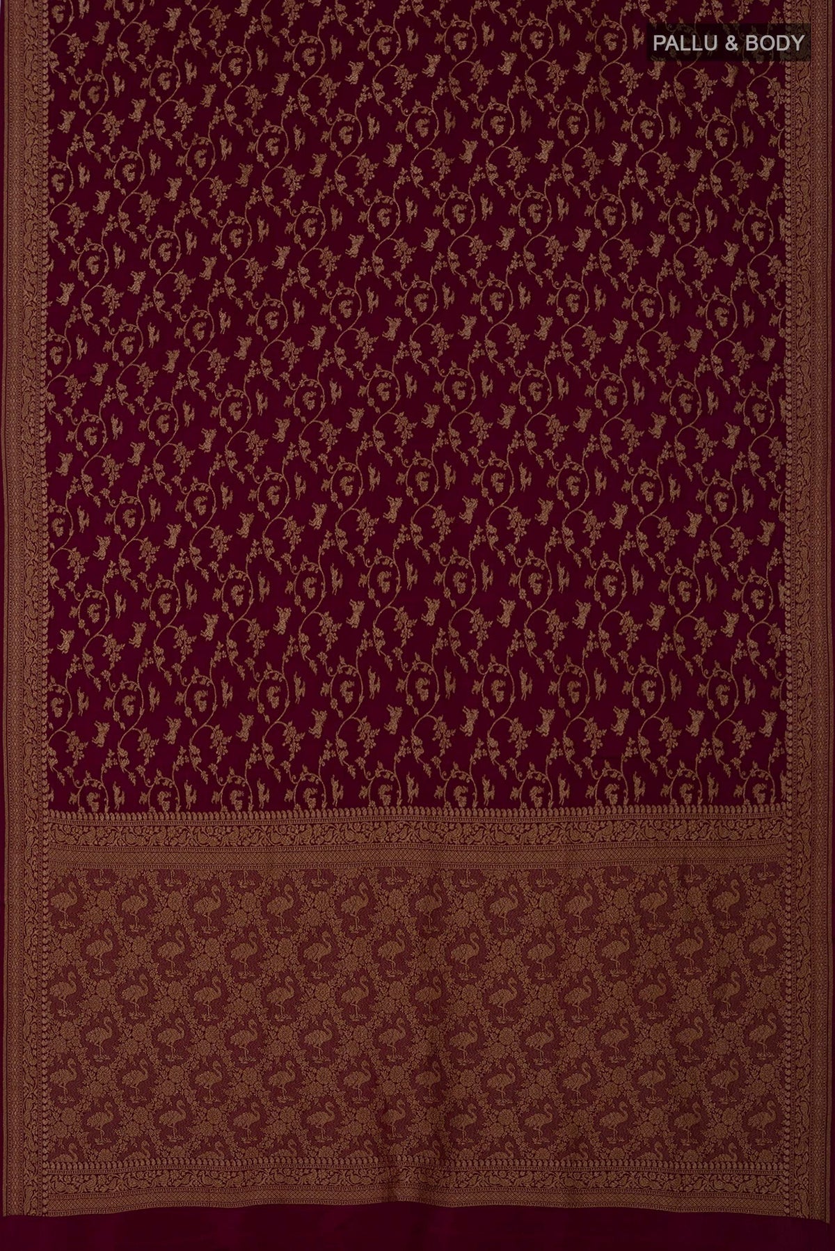 Flat view of Brown Georgette Saree with Fancy on the body and Zari Border. 