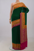 Green Georgette Saree with Fancy on the body and Fancy Border.  displayed on a mannequin