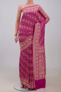 Pink Georgette Saree with Fancy on the body and Fancy Border.  displayed on a mannequin