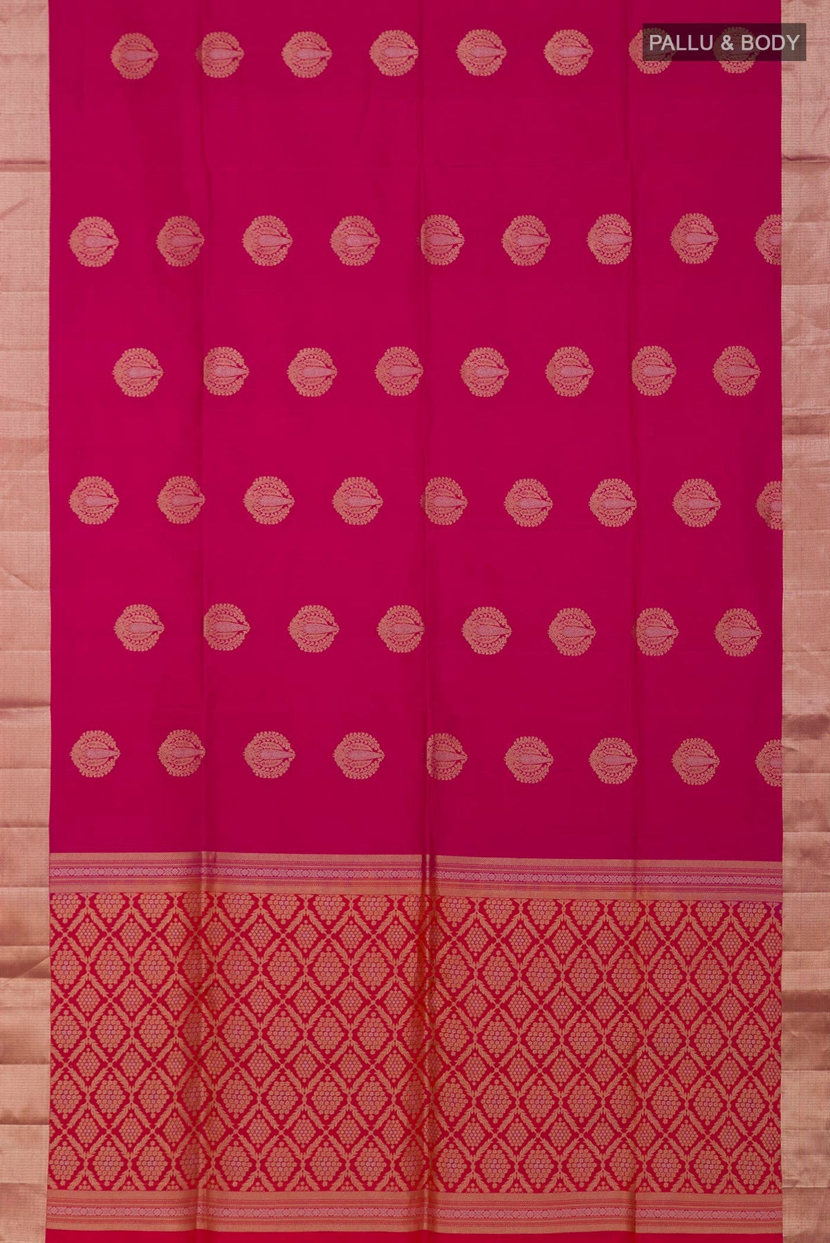 Flat view of Pink Soft Silk Saree with Zari Butta on the body and Zari Border. 