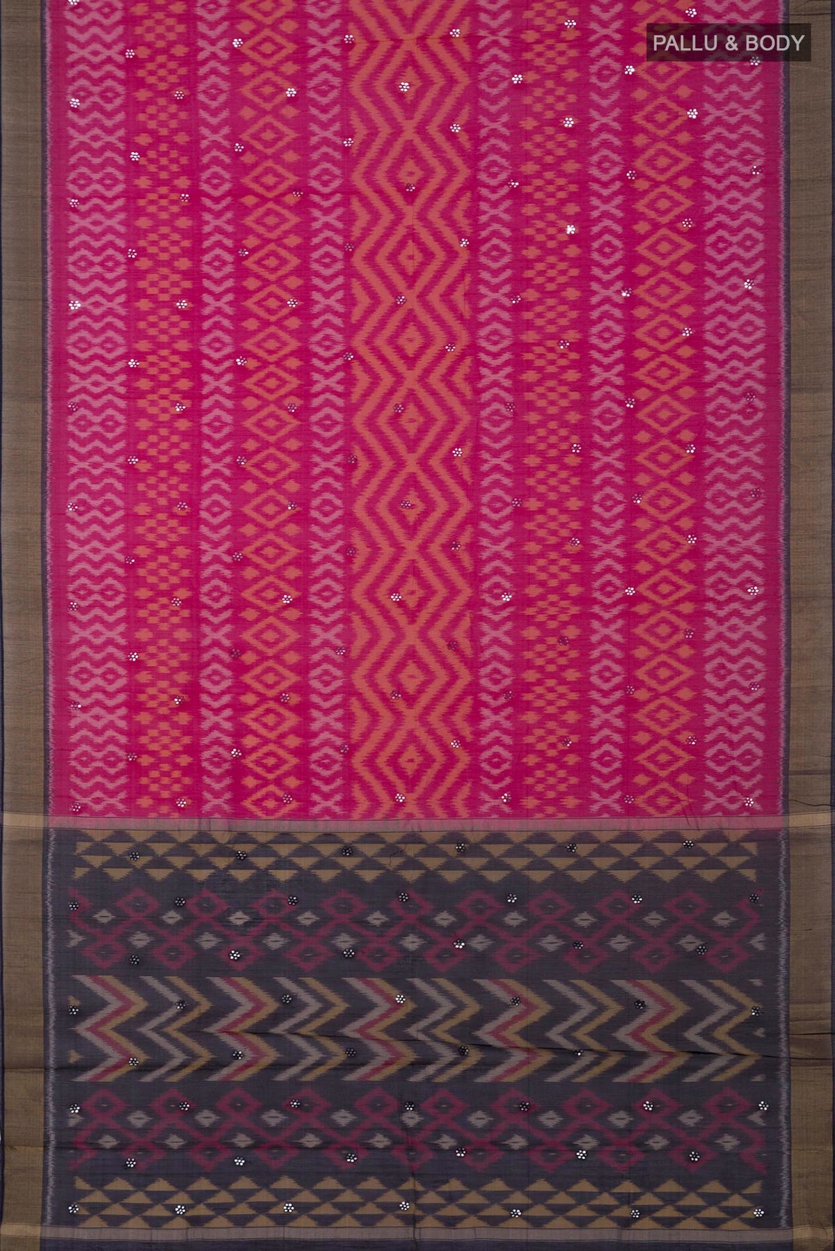 Flat view of Pink Silk Cotton Saree with Ikat design on the body and Zari Border. 